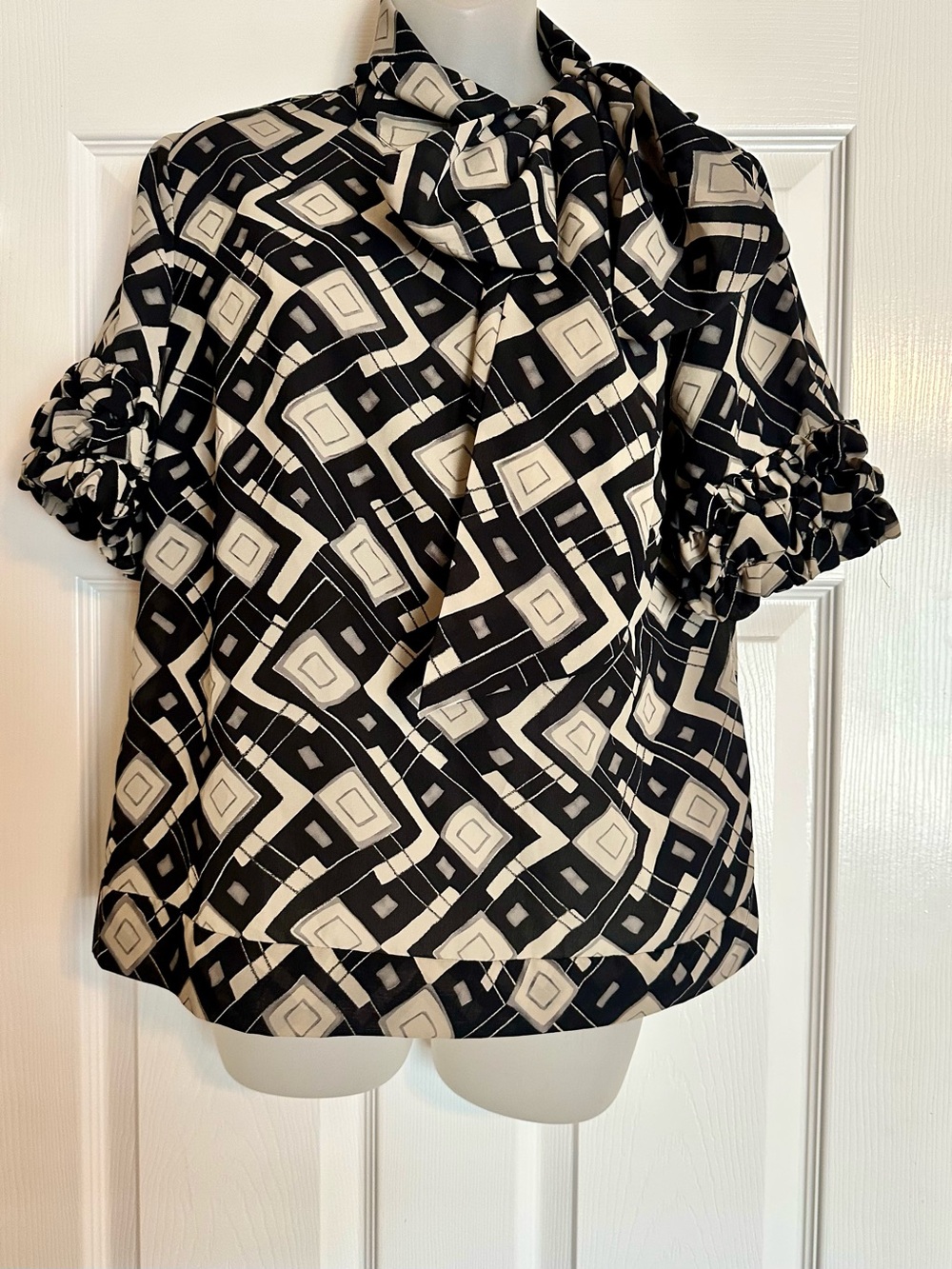Cato Black & Cream Geometric Tie-Neck Blouse with Ruffled Sleeves